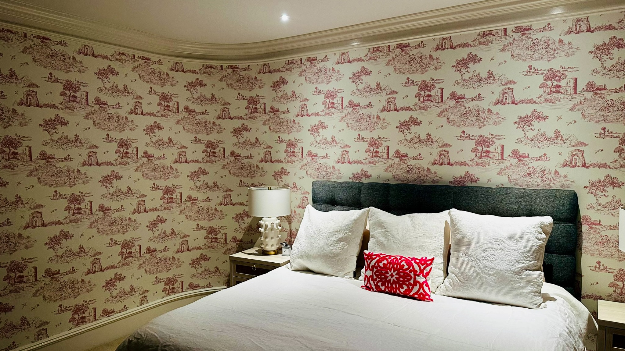 A real pink toile bedroom filled with well-chosen details