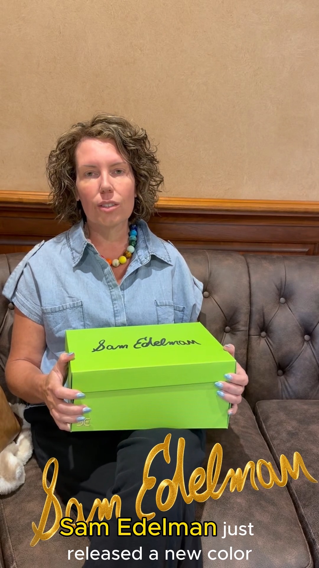 Jessica holding a bright green Sam Edelman shoebox in the Langley new-color reel cover